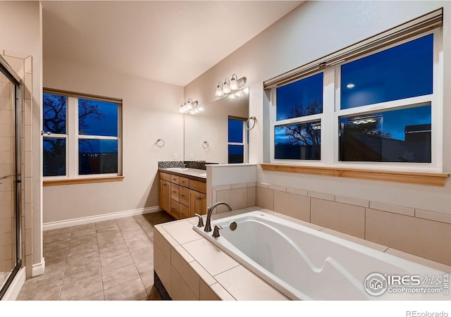 1356 Golden Eagle Way, Louisville, CO 80027 - full bath with a bath, tile patterned floors, baseboards, an enclosed shower, and vanity
