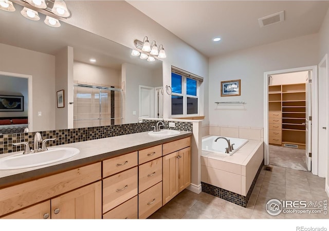 1356 Golden Eagle Way, Louisville, CO 80027 - bathroom featuring a shower stall, visible vents, tile patterned floors, and a sink