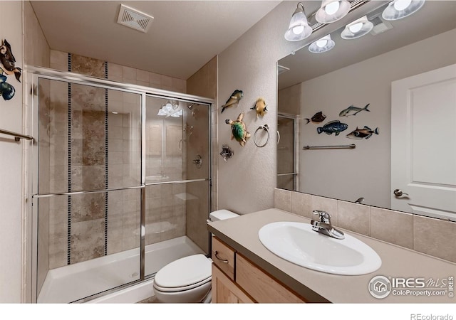 1356 Golden Eagle Way, Louisville, CO 80027 - full bath featuring a shower stall, toilet, vanity, and visible vents