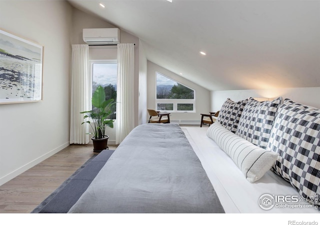 1048 Westview Dr, Boulder, CO 80303 - bedroom with recessed lighting, vaulted ceiling, wood finished floors, and a wall mounted AC
