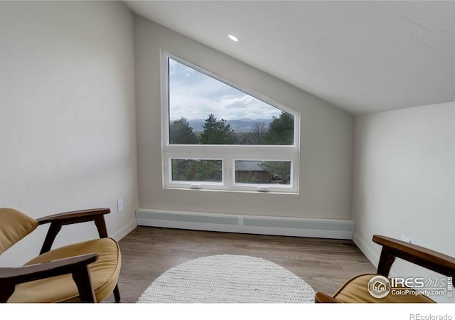 1048 Westview Dr, Boulder, CO 80303 - sitting room with baseboards, wood finished floors, and baseboard heating