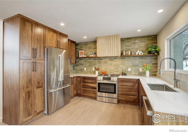 1048 Westview Dr, Boulder, CO 80303 - kitchen featuring brown cabinets, open shelves, appliances with stainless steel finishes, a sink, and light wood finished floors