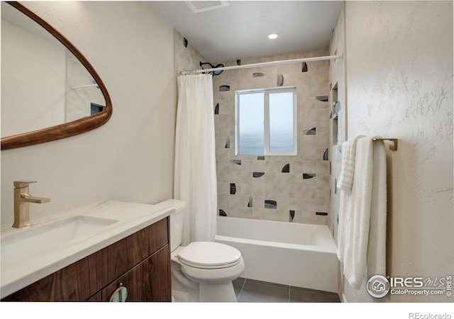 1048 Westview Dr, Boulder, CO 80303 - full bathroom featuring vanity, tile patterned floors, shower / bath combo, and toilet