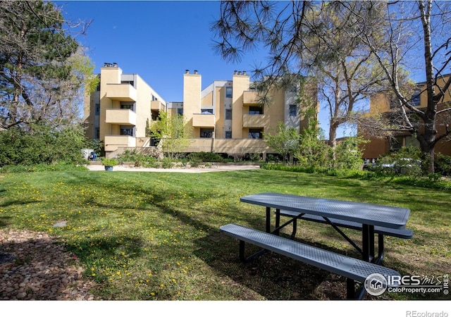 surrounding community with a lawn