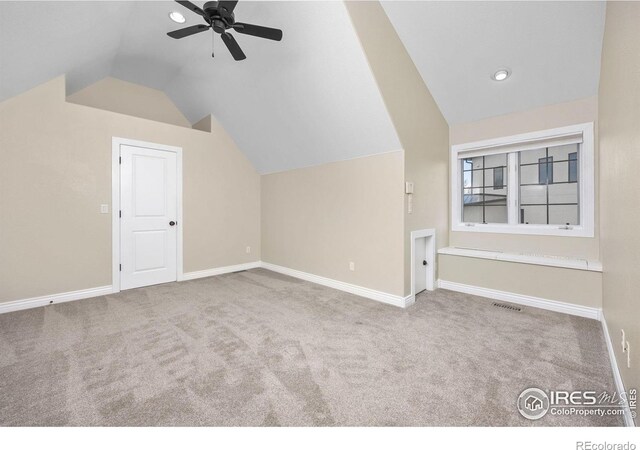 895 Owl Grove Pl, Loveland, CO 80537 - bonus room with vaulted ceiling, visible vents, baseboards, ceiling fan, and carpet floors