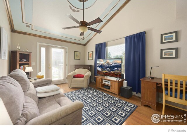 1020 Rolland Moore Dr Unit 2D, Fort Collins, CO 80526 - living room with ceiling fan, vaulted ceiling, crown molding, and light wood finished floors