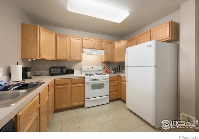1020 Rolland Moore Dr Unit 2D, Fort Collins, CO 80526 - kitchen featuring under cabinet range hood, white appliances, a sink, and light brown cabinetry
