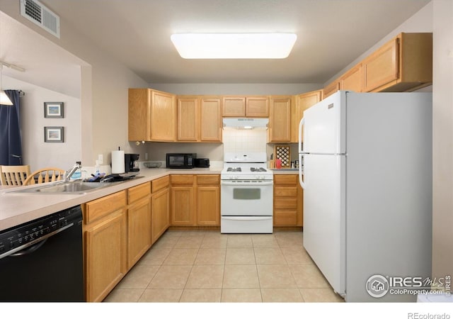 1020 Rolland Moore Dr Unit 2D, Fort Collins, CO 80526 - kitchen featuring light brown cabinets, a sink, white appliances, under cabinet range hood, and visible vents