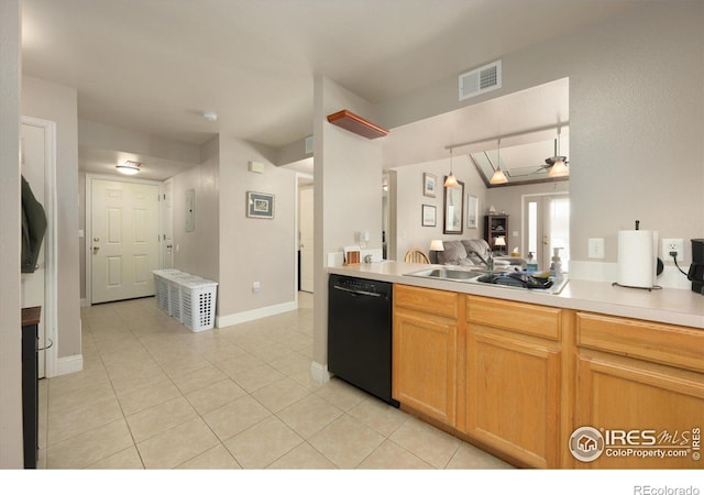 1020 Rolland Moore Dr Unit 2D, Fort Collins, CO 80526 - kitchen with a sink, light tile patterned floors, light countertops, black dishwasher, and visible vents
