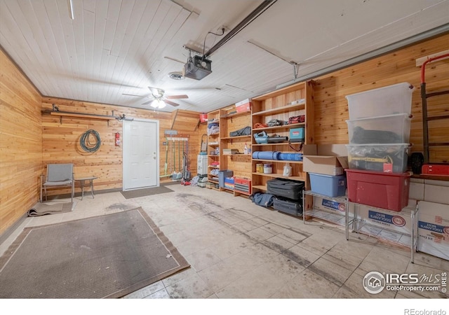 1020 Rolland Moore Dr Unit 2D, Fort Collins, CO 80526 - garage featuring wood walls and a garage door opener