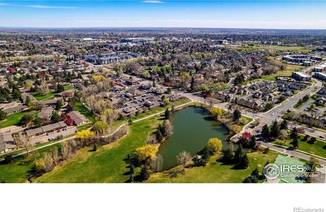 1020 Rolland Moore Dr Unit 2D, Fort Collins, CO 80526 - birds eye view of property with a water view