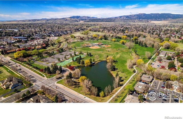 1020 Rolland Moore Dr Unit 2D, Fort Collins, CO 80526 - aerial view with a water and mountain view and a residential view