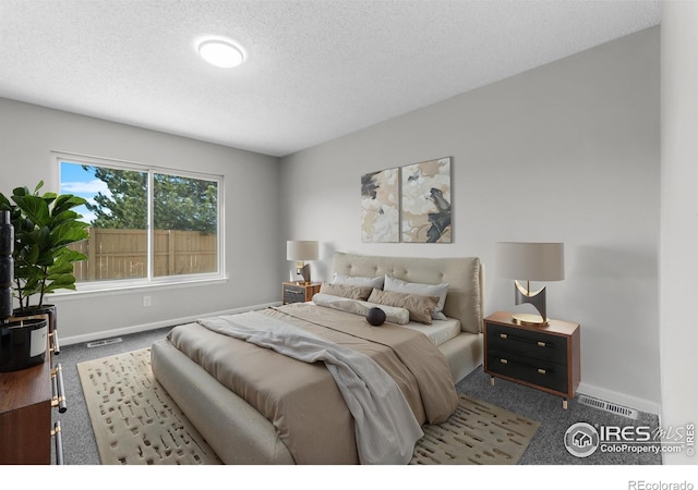 20336 Willowbend Ln, Parker, CO 80138 - bedroom with carpet flooring and a textured ceiling
