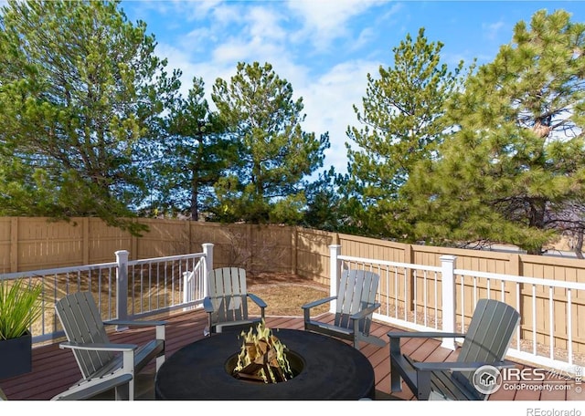 20336 Willowbend Ln, Parker, CO 80138 - deck with a fire pit and a fenced backyard