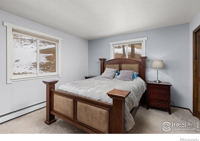 74 Sky Trail Rd, Boulder, CO 80302 - bedroom with light carpet and baseboard heating