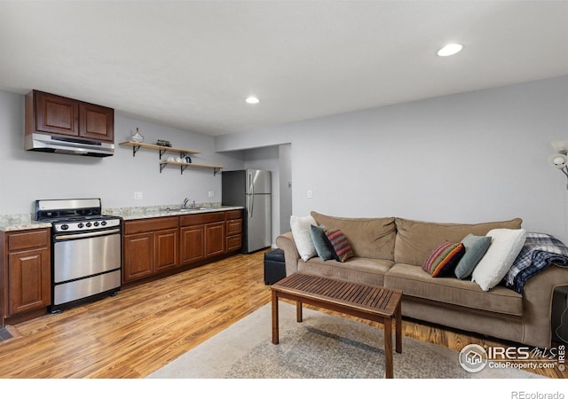 74 Sky Trail Rd, Boulder, CO 80302 - living area with light wood-style flooring, recessed lighting, and bar area