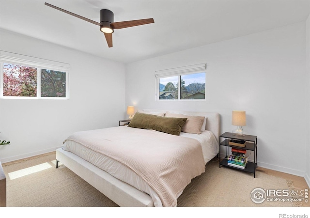 586 Aztec Dr, Boulder, CO 80303 - bedroom featuring a ceiling fan and baseboards