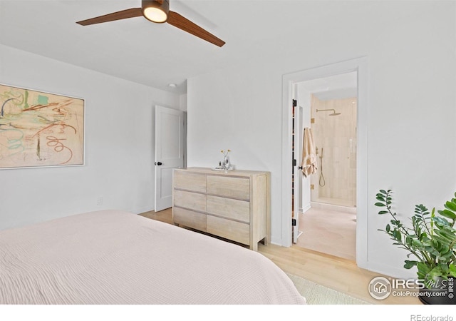 586 Aztec Dr, Boulder, CO 80303 - bedroom with ceiling fan, ensuite bath, and light wood-style flooring