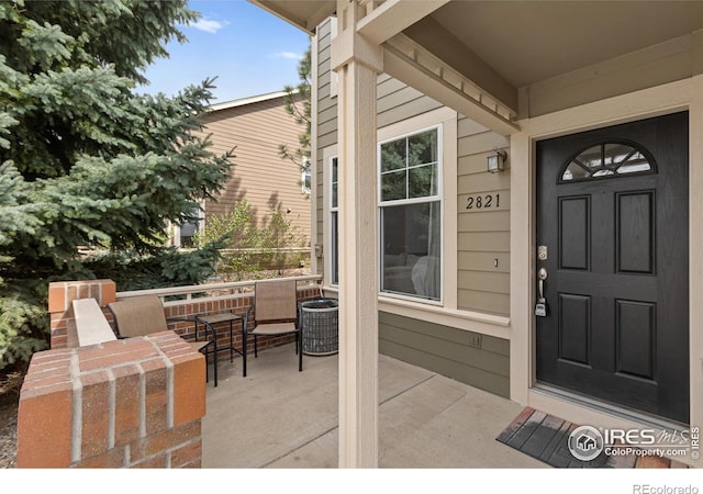 doorway to property featuring central AC
