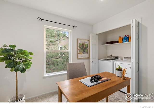 office space with baseboards, carpet floors, and independent washer and dryer