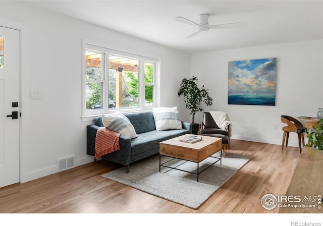 220 28th St, Boulder, CO 80305 - living room with baseboards, ceiling fan, visible vents, and wood finished floors
