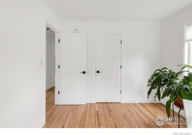 220 28th St, Boulder, CO 80305 - bedroom featuring baseboards and light wood-style flooring