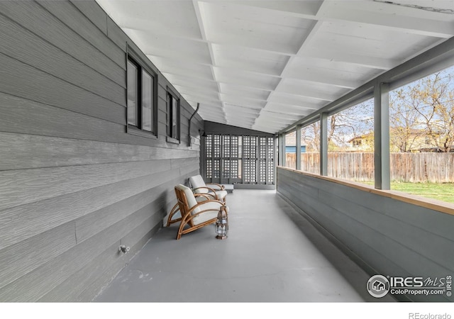 220 28th St, Boulder, CO 80305 - sunroom featuring wooden walls and concrete flooring