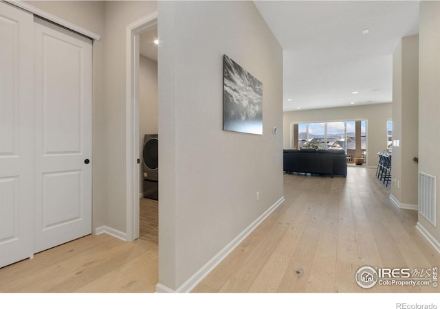 3351 Heron Lakes Pkwy, Berthoud, CO 80513 - hall with wood-type flooring, visible vents, baseboards, and recessed lighting
