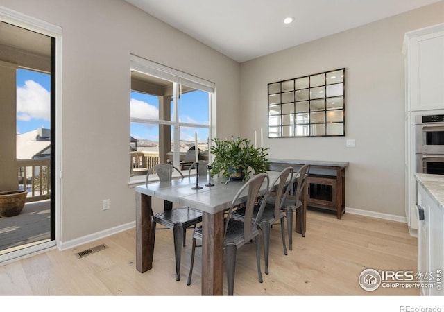 3351 Heron Lakes Pkwy, Berthoud, CO 80513 - dining space with recessed lighting, baseboards, visible vents, and light wood-type flooring