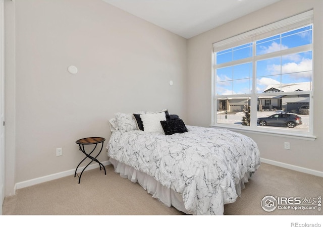 3351 Heron Lakes Pkwy, Berthoud, CO 80513 - bedroom featuring baseboards and carpet