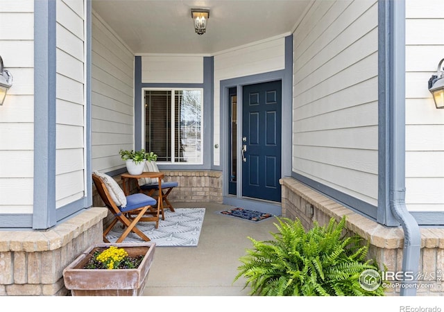 entrance to property with a porch