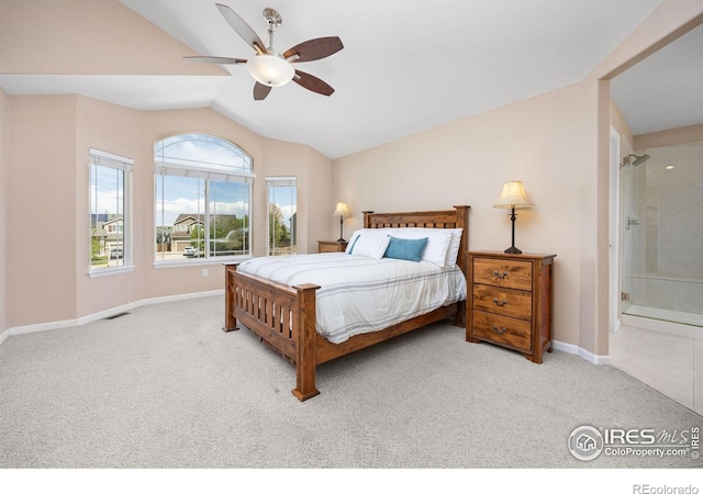 bedroom with ceiling fan, visible vents, vaulted ceiling, baseboards, and carpet