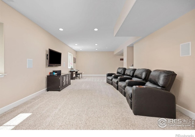 living room with baseboards, recessed lighting, and carpet