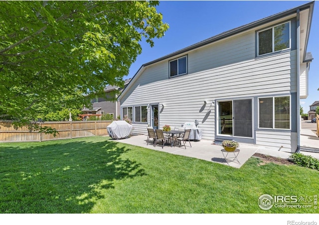 5912 Thistle Ridge Ave, Firestone, CO 80504 - back of house featuring a patio area