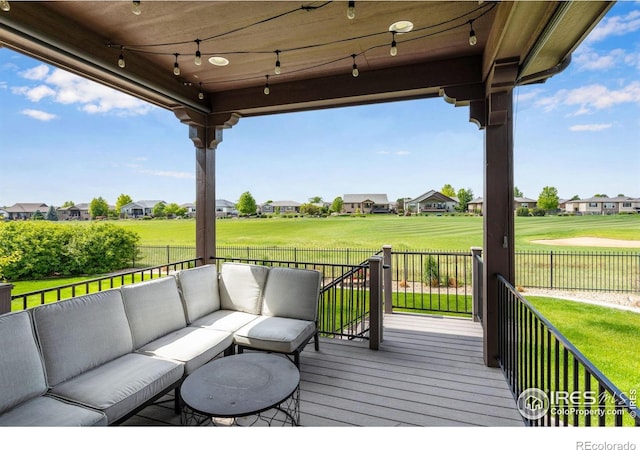6297 Crooked Stick Dr, Windsor, CO 80550 - wooden deck with outdoor lounge area, a residential view, and a ceiling fan