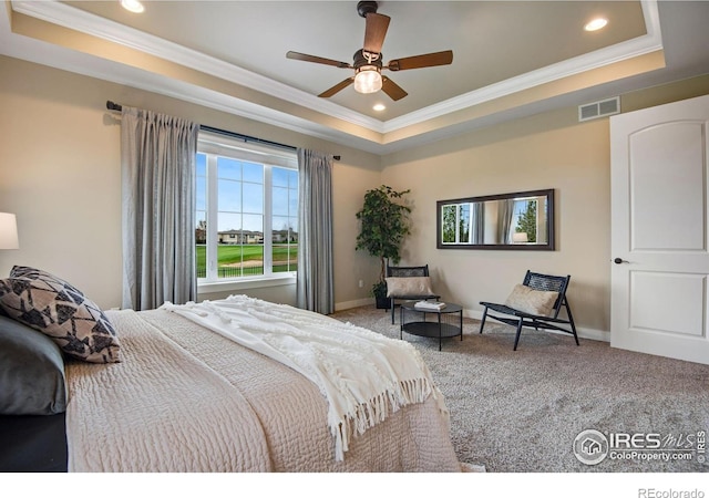 6297 Crooked Stick Dr, Windsor, CO 80550 - carpeted bedroom with a raised ceiling, ornamental molding, recessed lighting, baseboards, and a ceiling fan