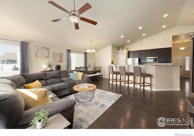 2433 Tabor St, Berthoud, CO 80513 - living area with ceiling fan, dark wood-type flooring, recessed lighting, a chandelier, and baseboards