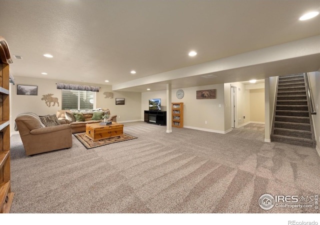 2433 Tabor St, Berthoud, CO 80513 - living area with carpet flooring, stairs, recessed lighting, and baseboards