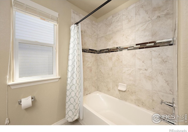 2433 Tabor St, Berthoud, CO 80513 - bathroom with shower / tub combo and baseboards