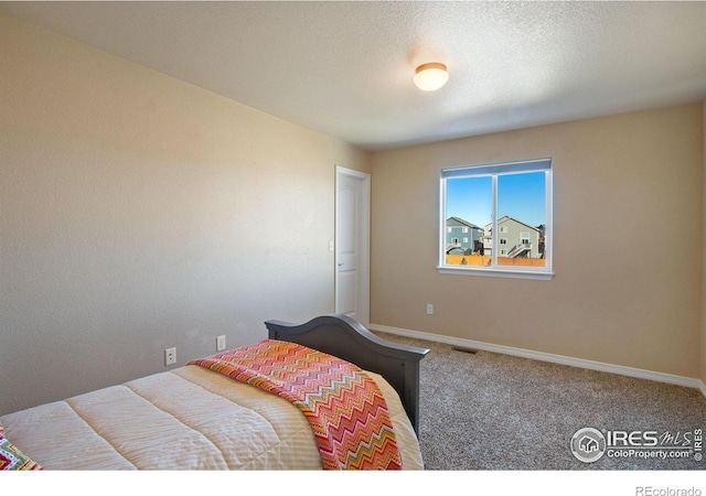 1484 Moraine Valley Dr, Severance, CO 80550 - bedroom with carpet floors and baseboards