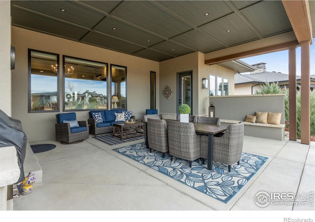 view of patio featuring outdoor lounge area and outdoor dining area