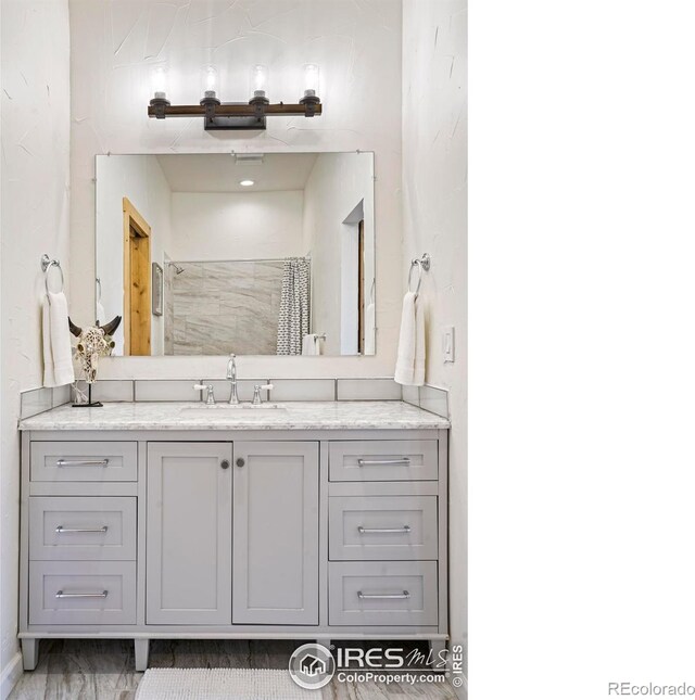 4 Dill Pickle Pl, Black Hawk, CO 80422 - full bathroom with vanity and tiled shower
