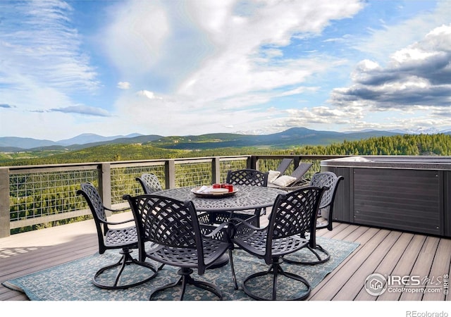 4 Dill Pickle Pl, Black Hawk, CO 80422 - wooden terrace featuring a mountain view and outdoor dining space