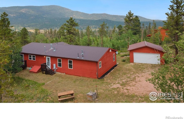 5547 N County Road 73c, Red Feather Lakes, CO 80545 - view of mountain backdrop with a forest