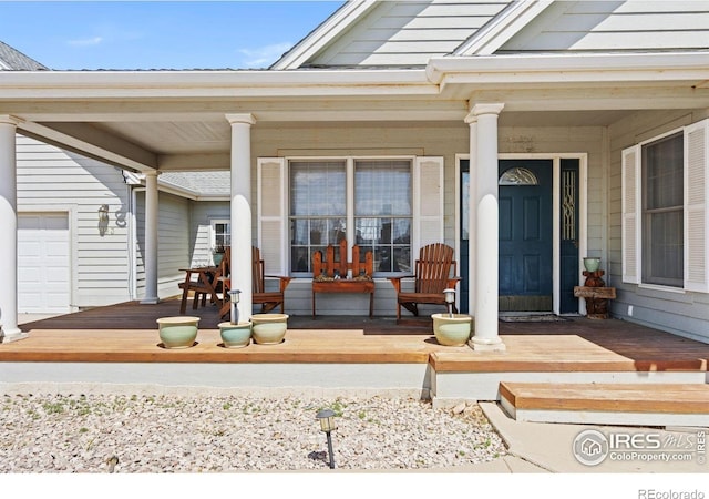 property entrance with covered porch