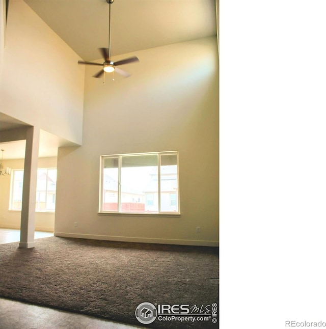 8710 8th St, Greeley, CO 80634 - carpeted spare room featuring high vaulted ceiling and a ceiling fan