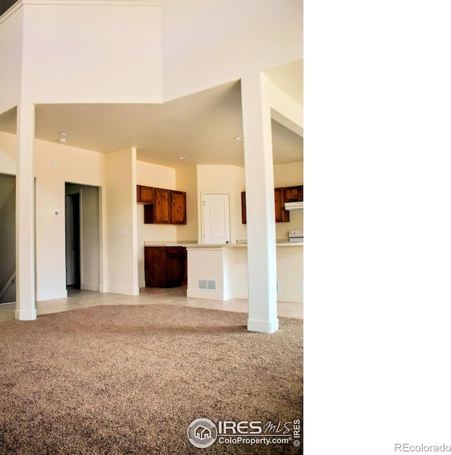 8710 8th St, Greeley, CO 80634 - unfurnished living room featuring baseboards