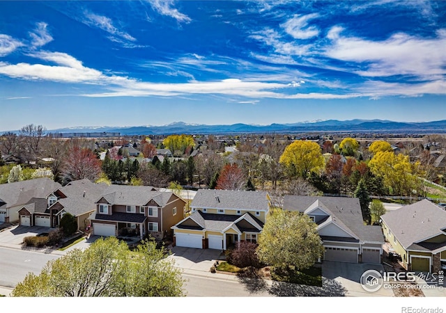 aerial view with a residential view and a mountain view