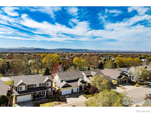 aerial view with a residential view and a mountain view