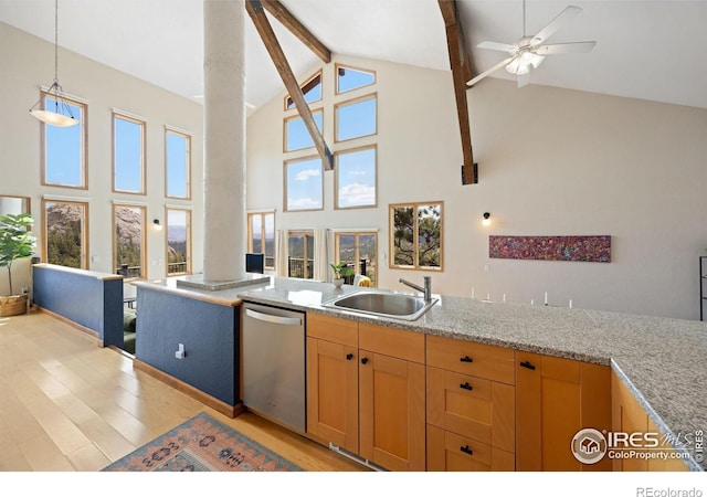 810 Manhead Mountain Dr, Livermore, CO 80536 - kitchen featuring dishwasher, a sink, high vaulted ceiling, light wood finished floors, and beam ceiling